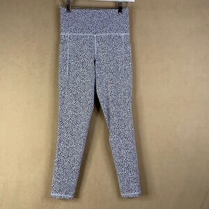 Athleta Women's Leggings Textured Tight XS Black White Leopard Print Pockets EUC